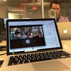 A picture of a laptop showing a remote team working on an impact assessment